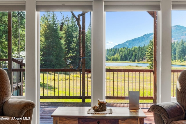 doorway with a water and mountain view