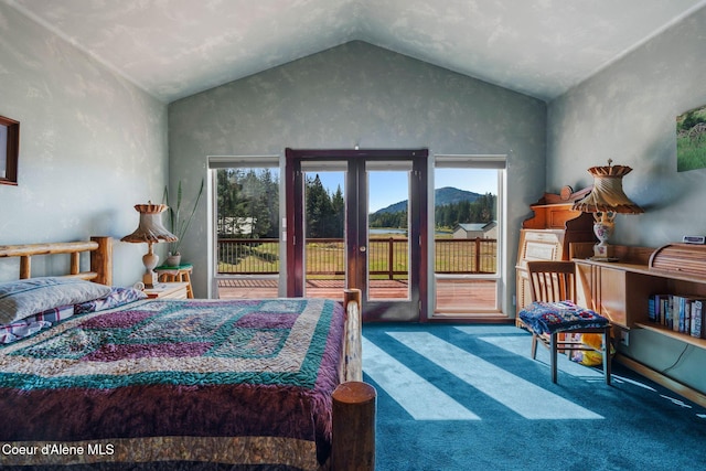 bedroom featuring french doors, vaulted ceiling, access to outside, carpet flooring, and a mountain view