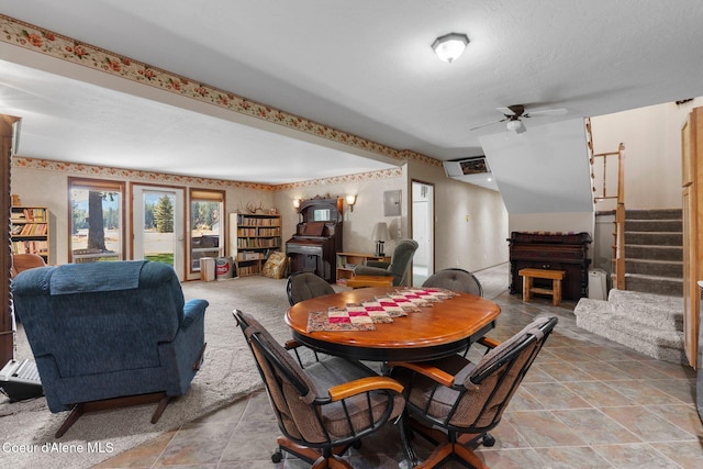 dining space with ceiling fan