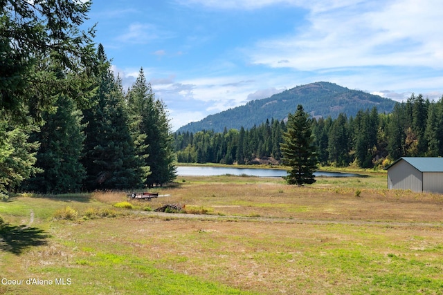 mountain view with a water view