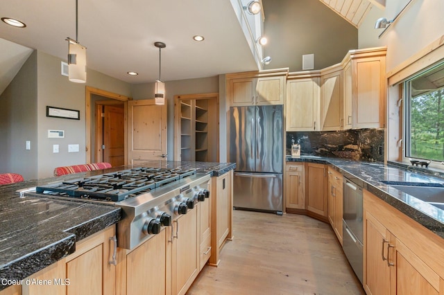 kitchen featuring pendant lighting, light hardwood / wood-style flooring, backsplash, stainless steel appliances, and light brown cabinets