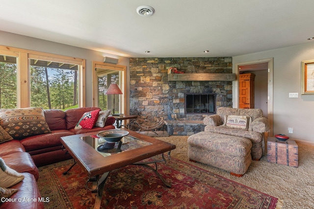 living room featuring a fireplace