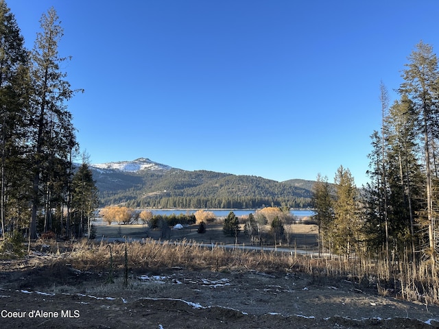 property view of mountains featuring a water view