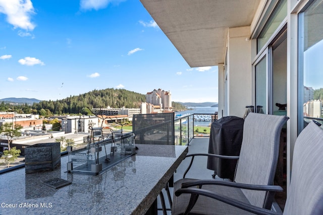 balcony featuring a mountain view