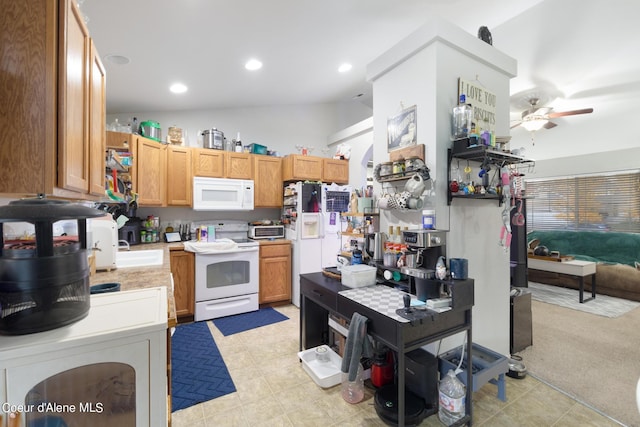 kitchen with ceiling fan and white appliances