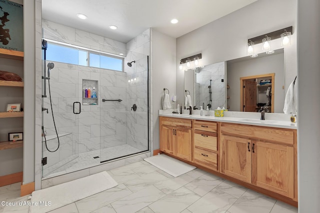 bathroom with vanity and walk in shower