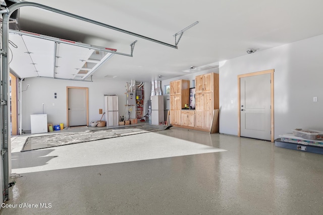 garage featuring refrigerator