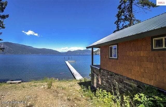 dock area with a water and mountain view