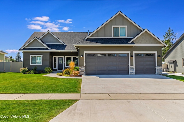 craftsman inspired home with a front yard