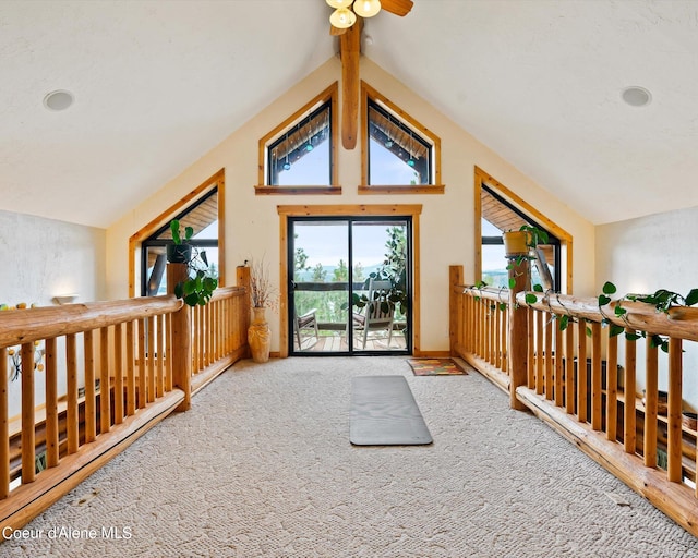 corridor featuring vaulted ceiling with beams and carpet floors