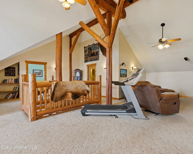 exercise room featuring lofted ceiling, carpet flooring, and ceiling fan