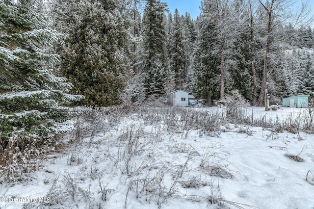 view of snow covered land