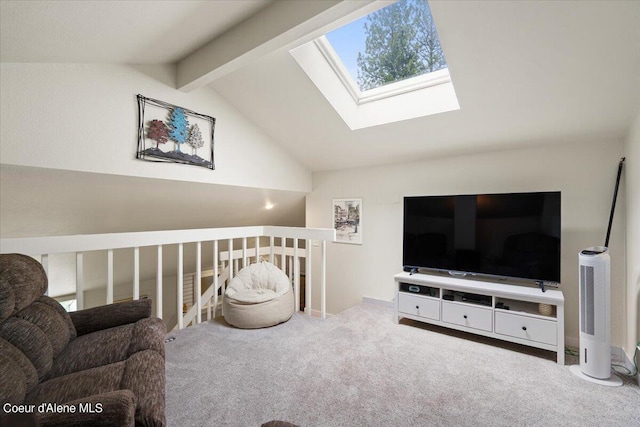 carpeted living room featuring lofted ceiling with skylight