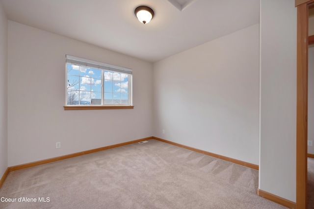 view of carpeted spare room