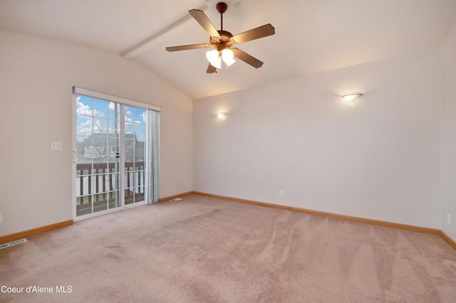 carpeted empty room with ceiling fan and lofted ceiling with beams