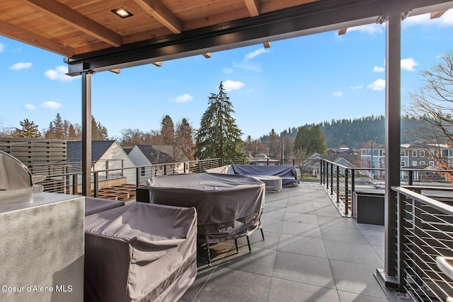 view of patio / terrace with a balcony