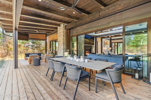 2763 E Lower Pasture Rd, Harrison, ID 83833 - wooden terrace featuring an outdoor living space with a fireplace and ceiling fan