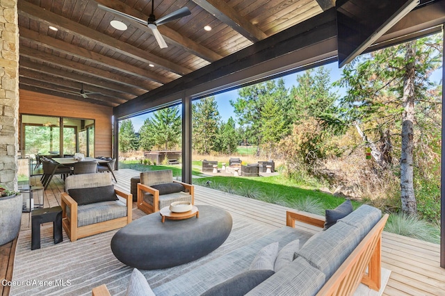 2763 E Lower Pasture Rd, Harrison, ID 83833 - deck with an outdoor living space with a fire pit and ceiling fan