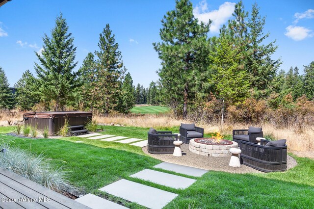 2763 E Lower Pasture Rd, Harrison, ID 83833 - view of yard with a fire pit, a hot tub, and a patio