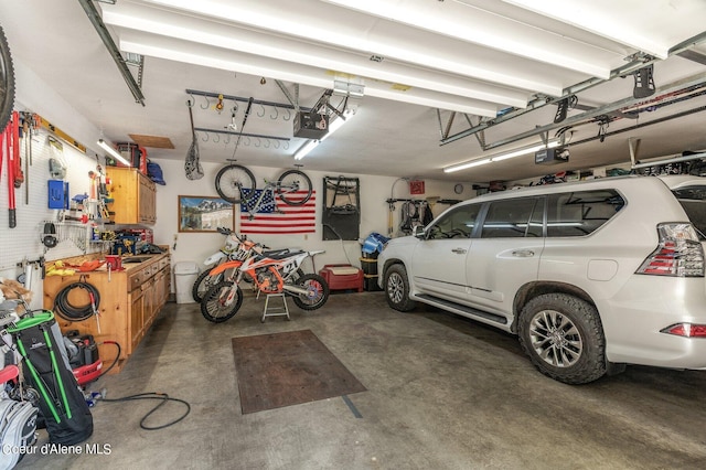 garage featuring a garage door opener