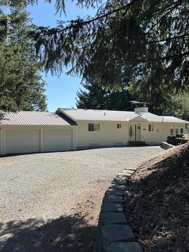 view of side of home with a garage