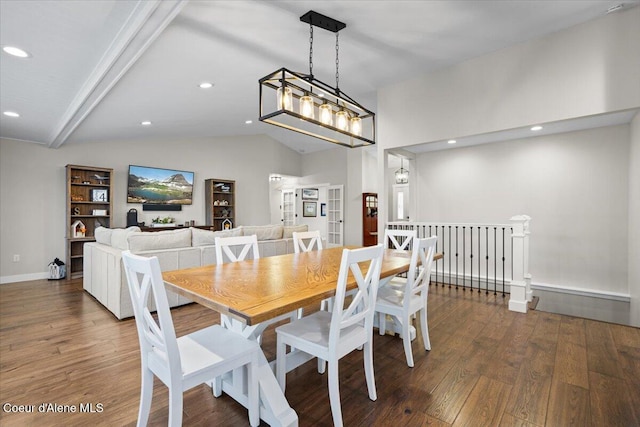 dining area with lofted ceiling and wood-type flooring