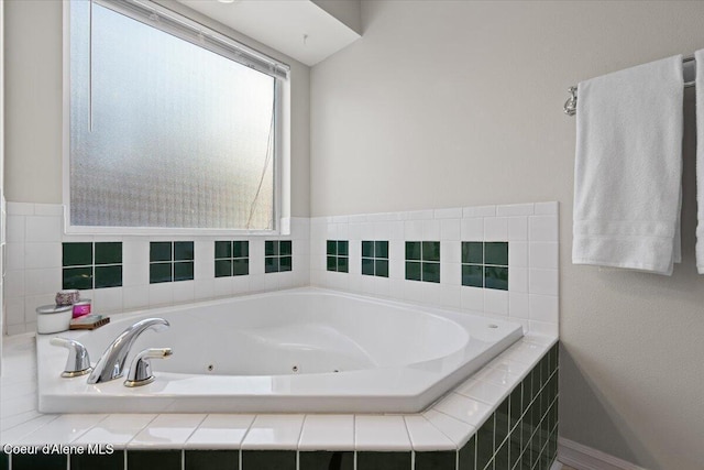 bathroom with a relaxing tiled tub