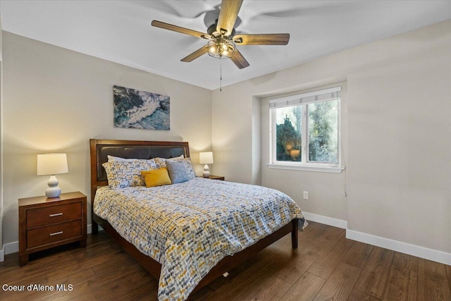 bedroom featuring dark wood-type flooring and ceiling fan