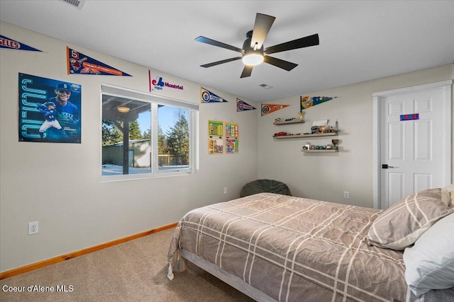 carpeted bedroom with ceiling fan