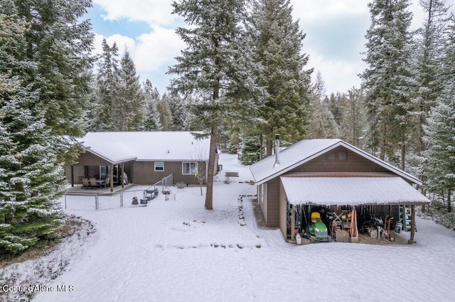 view of snow covered house