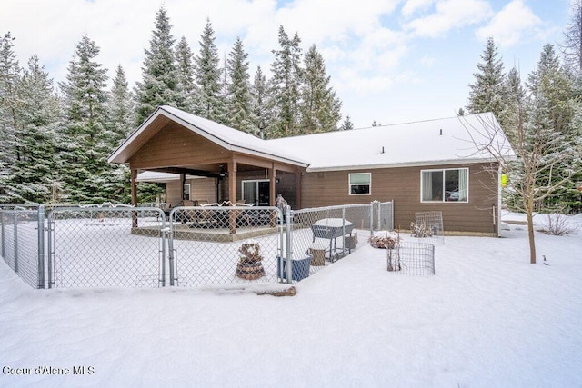 view of snow covered property