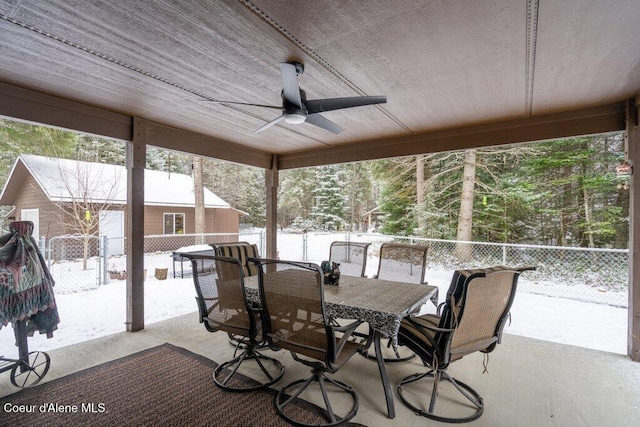 sunroom / solarium with ceiling fan