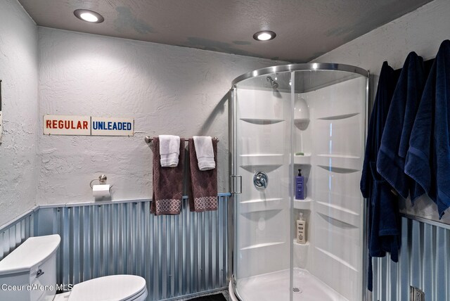 1715 Sherman Ave, Coeur Dalene, ID 83814 - bathroom with toilet and an enclosed shower
