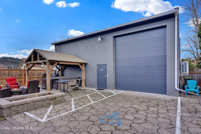 1715 Sherman Ave, Coeur Dalene, ID 83814 - view of patio / terrace with a gazebo and an outdoor fire pit