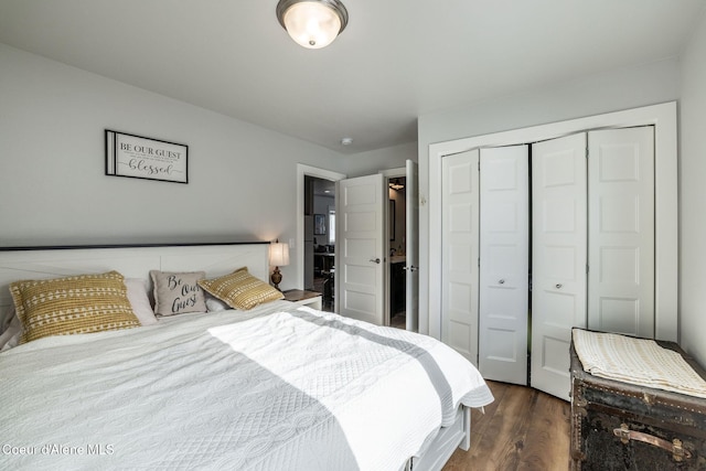 bedroom featuring a closet and wood finished floors