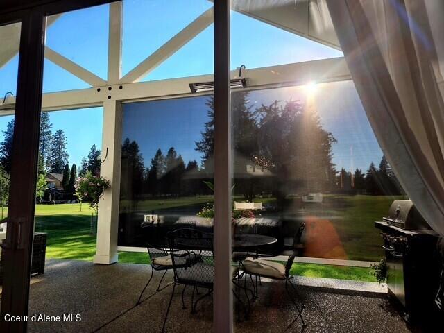 view of patio / terrace with a grill and outdoor dining space