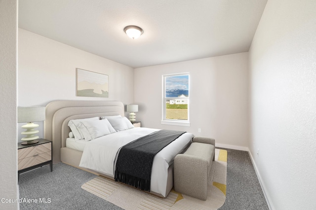 carpeted bedroom featuring baseboards