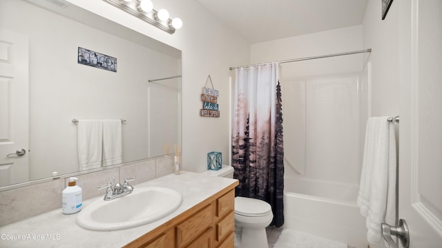 full bathroom with vanity, toilet, and shower / bath combo