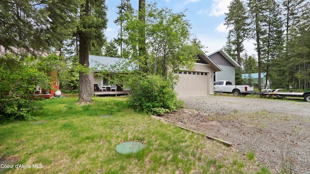 view of side of property featuring a garage