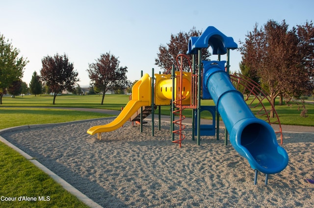 view of playground featuring a lawn