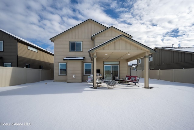 view of snow covered house