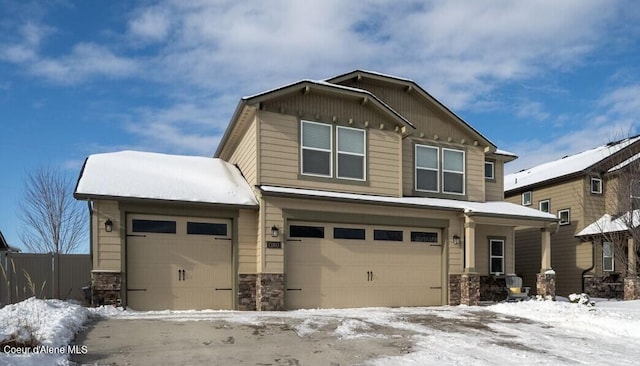 craftsman inspired home featuring a garage