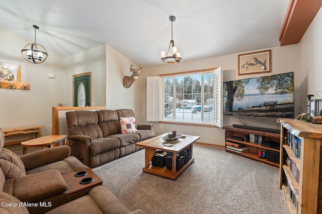 carpeted living room featuring an inviting chandelier and vaulted ceiling