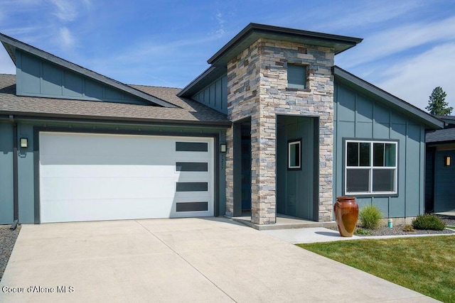 7257 Breaux Dr, Coeur Dalene, ID 83815 - contemporary home with board and batten siding, stone siding, and a garage