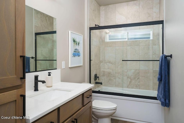 7257 Breaux Dr, Coeur Dalene, ID 83815 - full bathroom featuring enclosed tub / shower combo, vanity, and toilet