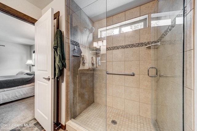 bathroom with a shower with shower door