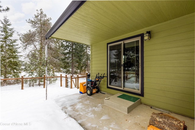 view of snow covered patio