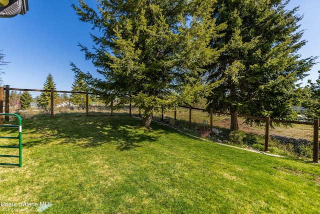 view of yard featuring fence