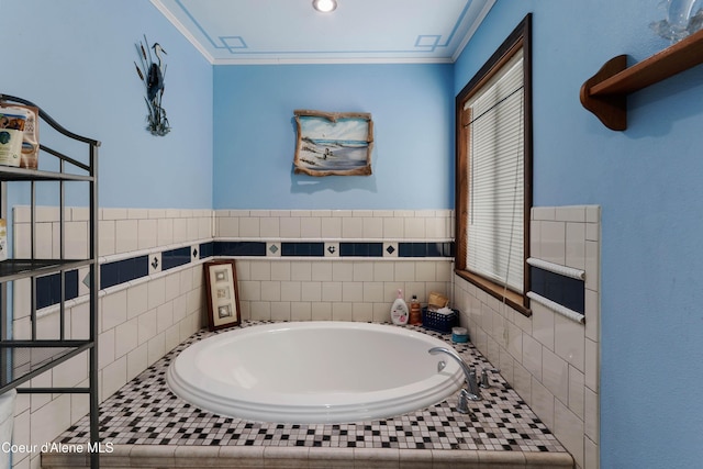 bathroom featuring crown molding and tiled bath