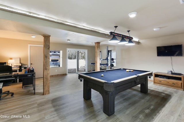 playroom featuring pool table, decorative columns, and hardwood / wood-style floors